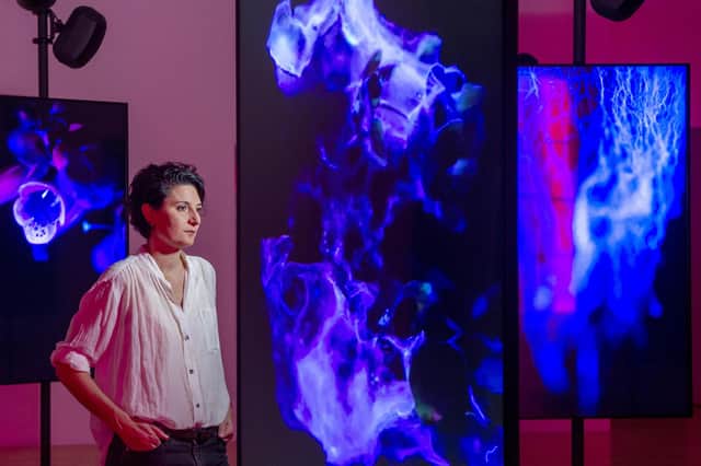 Angelica Mesiti with her exhibition 'In the Round'.