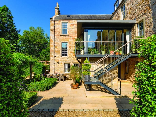 Woodhall House is surrounded by 7.8 acres of landscaped gardens and woodlands and features the flowing Water of Leith, which has been much enjoyed by the children and three dogs over the years.
There is a floodlit Astro-turf tennis court, hot tub, and seating to enjoy al fresco dining. There are also ample wildflower meadows.
Contact: Knight Frank