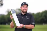 Shane Lowry shows off the BMW PGA Championship trophy after his win at Wentworth. Picture: Ross Kinnaird/Getty Images.