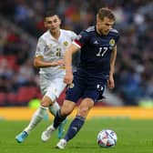 GLASGOW, SCOTLAND - JUNE 08: Stuart Armstrong of Scotland gets away from Eduard Spertsyan of Armenia during the UEFA Nations League League B Group 1 match between Scotland and Armenia at Hampden Park National Stadium on June 08, 2022 in Glasgow, Scotland. (Photo by Ian MacNicol/Getty Images)