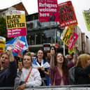 Protesters demonstrate outside the Conservative Party leadership hustings in Perth on August 16. Foreign Secretary, Liz Truss and former Chancellor Rishi Sunak are vying to become the new leader of the Conservative Party and the UK's next Prime Minister. (Photo by Jeff J Mitchell/Getty Images)