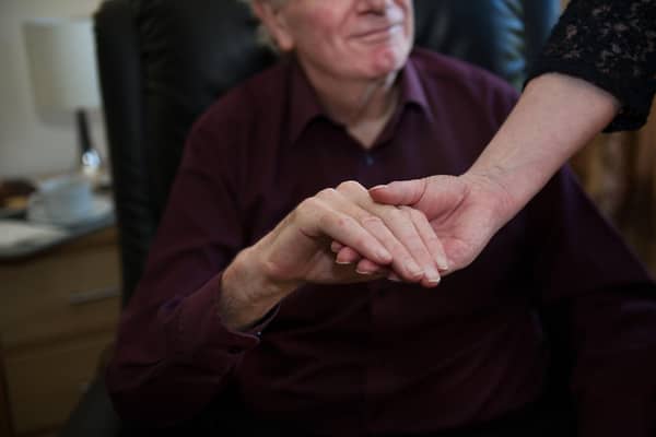 Care workers look after elderly people often because their families are unable to do it (Picture: John Devlin)