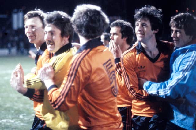 Hamish McAlpine celebrating Dundee United's League Cup final win over Dundee in December 1980 with team-mates, including Davie Dodds, Dave Narey and Frank Kopel.