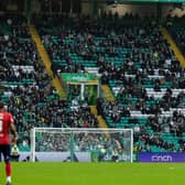 There were gaps in the crowd at Celtic Park - no doubt due to the poor weather.