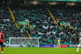 There were gaps in the crowd at Celtic Park - no doubt due to the poor weather.