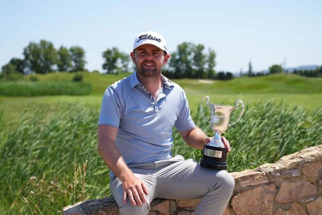 Liam Johnston enjoyed getting a trophy back in his hands after coming out on top on Spanish soil for a second time on the Challenge Tour. Picture: Alex Caparros/Getty Images.