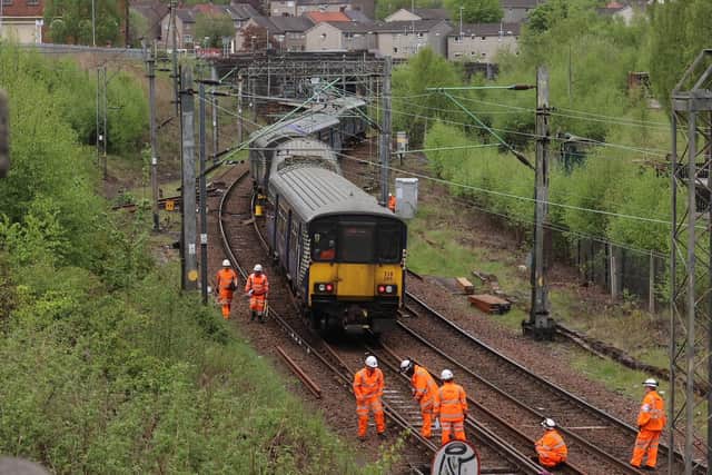 The line at Coatbridge is expected to stay shut until the end of Sunday. Picture: Donald Stirling