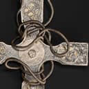 The pectoral cross after conservation with porcupine quills among the fine hand tools used to remove corrosion and dirt from the treasure. PIC: NMS.