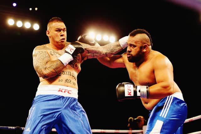 Loni Uhila, right, takes on Dave Letele in Hamilton, New Zealand, in 2014. Picture: Hannah Peters/Getty Images