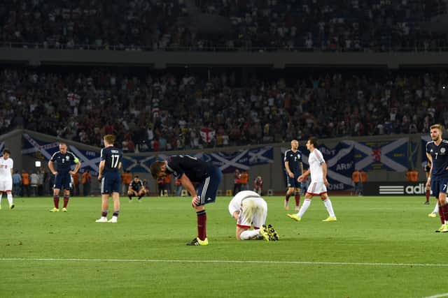 Scotland players cut dejected figures at full-time after suffering a 1-0 defeat in Georgia in a Euro 2016 qualifier.