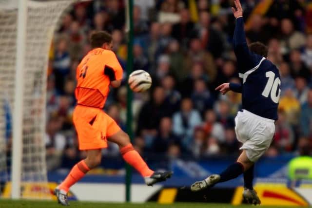Scotland's last Euro play-offs started well with a 1-0 win over the Netherlands thanks to James McFadden's goal. But Holland made them pay in Amsterdam. (Picture: SNS)