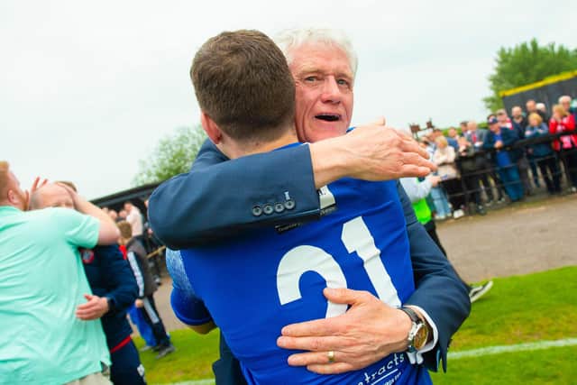 Spartans' chairman Craig Graham hugs one of the players after the League Two play-off win over Albion Rovers. (Photo by Sammy Turner / SNS Group)