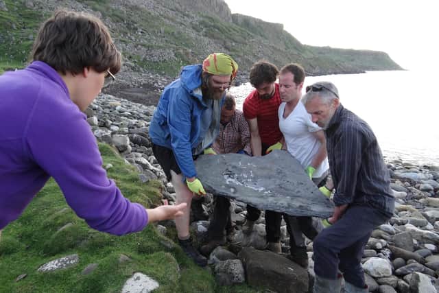 The fossilised skeleton of the Jurassic pterosaur is removed from a beach on the Isle of Skye.