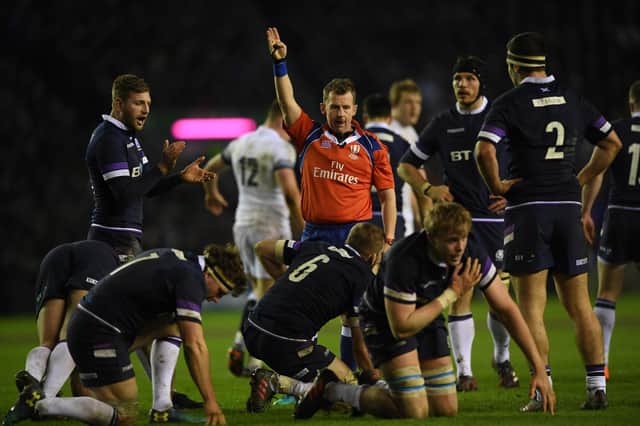 Referee Nigel Owens signals turnover ball for Scotland during the 2018 Six Nations match between Scotland and England at Murrayfield. Picture: Shaun Botterill/Getty Images