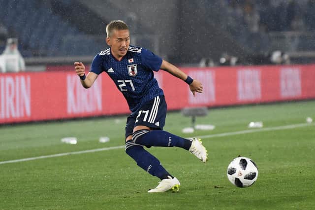 Yosuke Ideguchi of Japan in action during the international friendly match against Ghana.