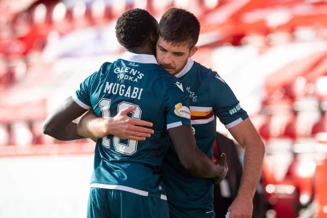 Motherwell defender Bevis Mugabi has dislocated his shoulder.