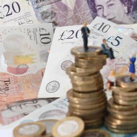 Millions of people on low incomes will start to receive payments of £324 into their bank accounts from Tuesday as part of the UK Government's cost-of-living support. Picture: Joe Giddens/PA Wire