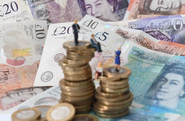 Millions of people on low incomes will start to receive payments of £324 into their bank accounts from Tuesday as part of the UK Government's cost-of-living support. Picture: Joe Giddens/PA Wire