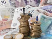 Millions of people on low incomes will start to receive payments of £324 into their bank accounts from Tuesday as part of the UK Government's cost-of-living support. Picture: Joe Giddens/PA Wire