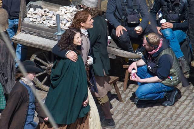 Filming begins for American TV Series Outlander at Dysart Harbour in 2015. Pictured are  Sam Heughan (Jamie) and Caitriona Balfe (Claire) on set of season two of the series.