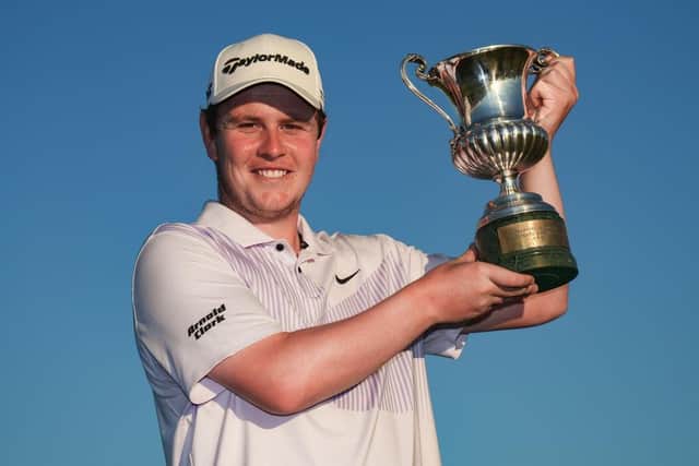 Bob MacIntyre celebrates with the trophy after winning the DS Automobiles Italian Open at Marco Simone Golf Club in Rome, where he'll be aiming to return for next year's Ryder Cup. Picture: Andrew Redington/Getty Images.