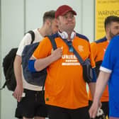 Feeling down but with their heads held high after lavish praise for their behaviour in Seville, Rangers fans arriving home after seeing their side lose in Spain.
Pic: Lisa Ferguson