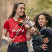 Ellie McLaren and Anna Scott pose at the Old Fruitmarket in Glasgow to promote the city's Piping Live! festival. Picture: Jamie Simpson