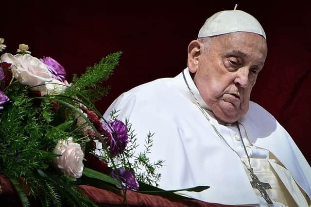 Pope Francis has died, a senior Vatican official has announced. (Photo by TIZIANA FABI/AFP via Getty Images)
