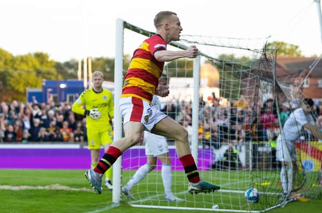 Partick Thistle's Scott Tiffoney celebrates after scoring to make it 3-0 during the emphatic win over Ayr United.