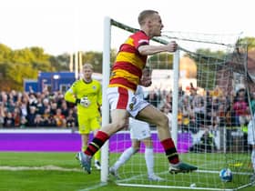 Partick Thistle's Scott Tiffoney celebrates after scoring to make it 3-0 during the emphatic win over Ayr United.