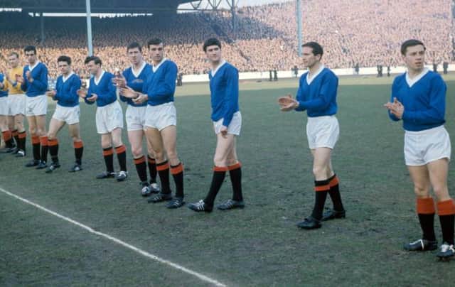 A Rangers pre-match line-up from the 1960-61 season featuring four players who scored 100 goals for the club - Davie Wilson (far left), Jim Forrest (fourth from left), John Greig (centre) and Ralph Brand (second from right). (Photo by SNS Group).