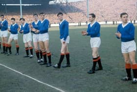A Rangers pre-match line-up from the 1960-61 season featuring four players who scored 100 goals for the club - Davie Wilson (far left), Jim Forrest (fourth from left), John Greig (centre) and Ralph Brand (second from right). (Photo by SNS Group).