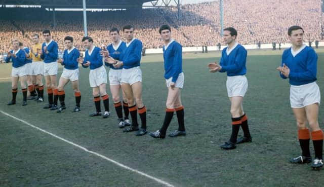 A Rangers pre-match line-up from the 1960-61 season featuring four players who scored 100 goals for the club - Davie Wilson (far left), Jim Forrest (fourth from left), John Greig (centre) and Ralph Brand (second from right). (Photo by SNS Group).
