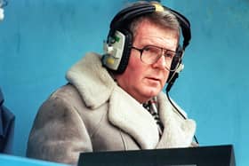 John Motson, pictured in his trademark sheepskin coat, provided the soundtrack to some of football's most memorable moments