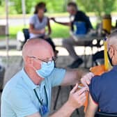 A member of the public receives a Covid vaccination at a car park in Glasgow (Picture: Jeff J Mitchell/Getty Images)