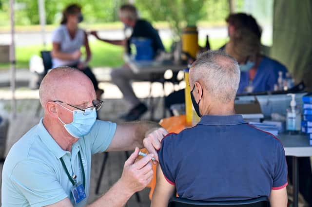 A member of the public receives a Covid vaccination at a car park in Glasgow (Picture: Jeff J Mitchell/Getty Images)