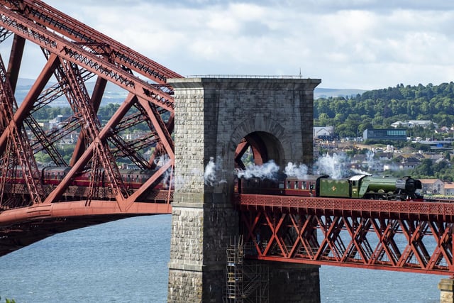 The Flying Scotsman crosses the Forth Bridge as part of its Centenary Tour
