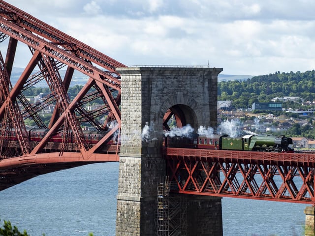 The Flying Scotsman crosses the Forth Bridge as part of its Centenary Tour