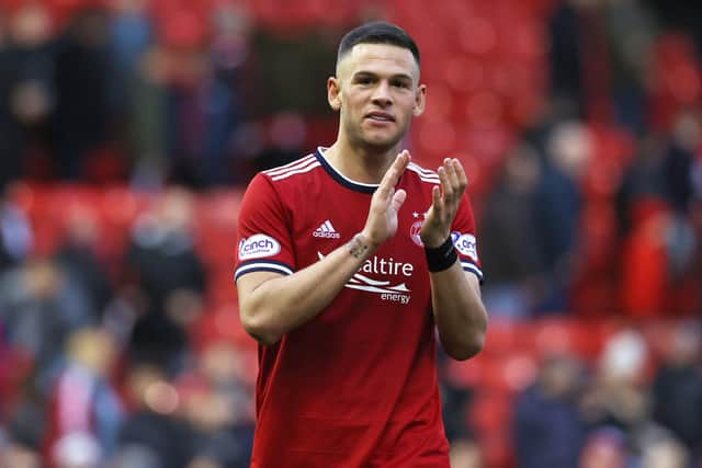 Christian Ramirez applauds the Aberdeen fans at full time