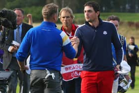 Keegan Bradley, right, shakes hands with Jamie Donaldson after their singles match in the 2014 Ryder Cup at Gleneagles. Picture: Ross Kinnaird/Getty Images.