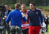 Keegan Bradley, right, shakes hands with Jamie Donaldson after their singles match in the 2014 Ryder Cup at Gleneagles. Picture: Ross Kinnaird/Getty Images.
