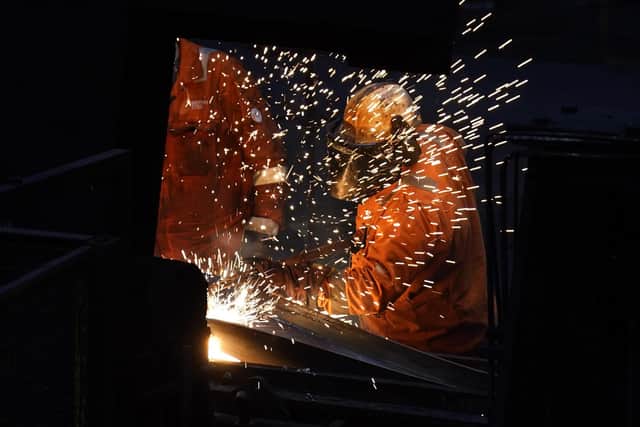 A worker in action at a steel mill. Picture: Danny Lawson/PA Wire