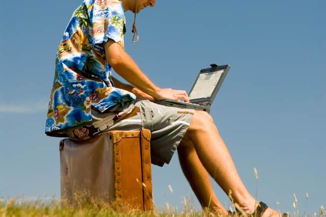 With a laptop the world of work could be international. Pic: Alamy/PA