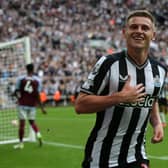 Harvey Barnes celebrates after scoring on his Newcastle debut against Aston Villa. (Photo by IAN HODGSON/AFP via Getty Images)