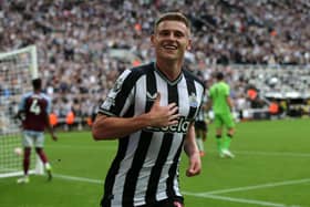 Harvey Barnes celebrates after scoring on his Newcastle debut against Aston Villa. (Photo by IAN HODGSON/AFP via Getty Images)