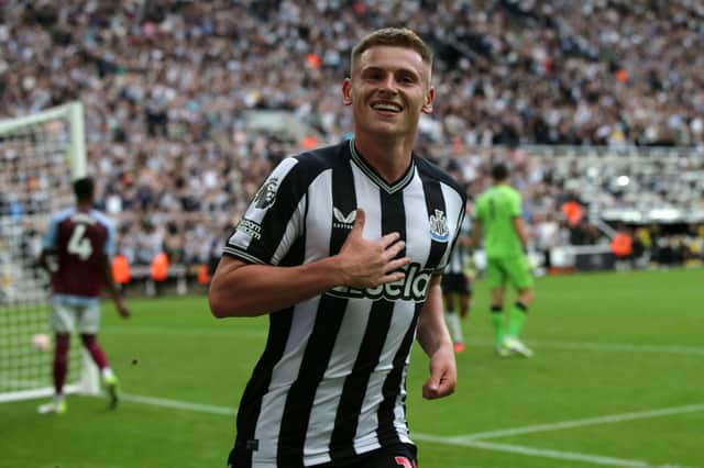 Harvey Barnes celebrates after scoring on his Newcastle debut against Aston Villa. (Photo by IAN HODGSON/AFP via Getty Images)