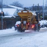 Gritters try to keep road clear from heavy snow in Kirkliston West Lothian.