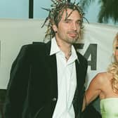 Pamela Anderson with her then husband Tommy Lee, pictured in 1999 in Los Angeles (Picture: Lucy Nicholson/AFP via Getty Images)