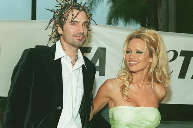 Pamela Anderson with her then husband Tommy Lee, pictured in 1999 in Los Angeles (Picture: Lucy Nicholson/AFP via Getty Images)