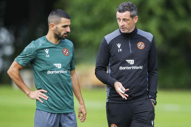 Dundee United manager Jack Ross and Aziz Behich during a Dundee United training at St Andrews ahead of the trip to AZ Alkmaar. (Photo by Mark Scates / SNS Group)